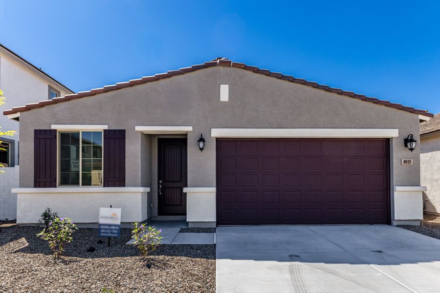 Front exterior of a new home in Rialta, Mesa, AZ, highlighting curb appeal (Image 1). Front exterior of a new home in Rialta, Mesa, AZ, highlighting curb appeal (Image 1).