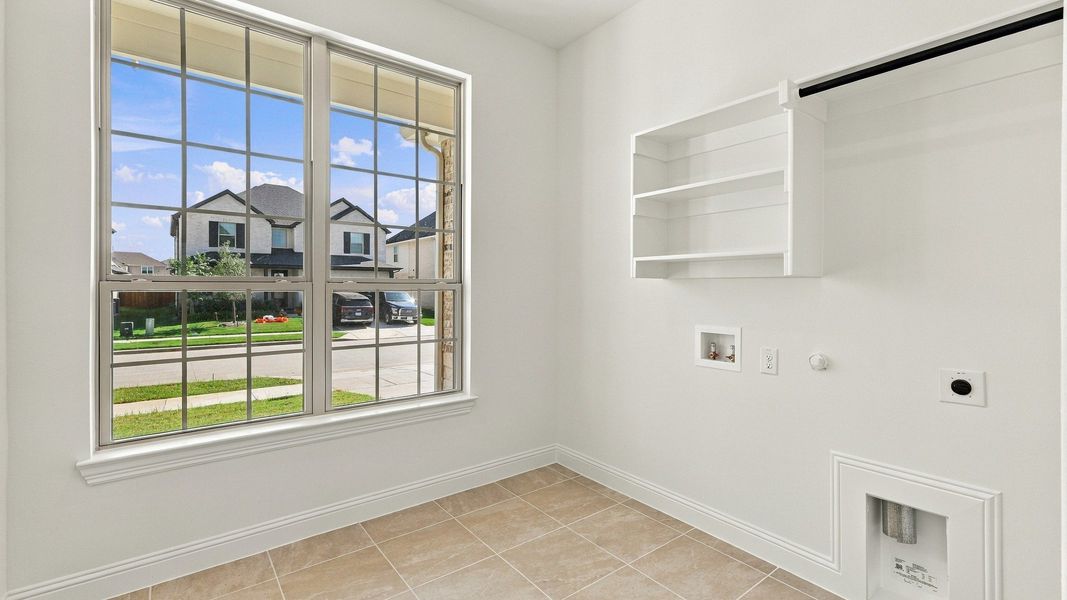 Furnished interior view inside a new home in Green Meadows Classic, Celina (Image 47).