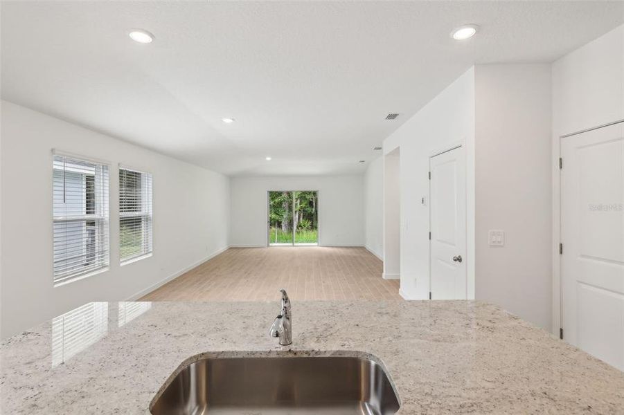 Furnished interior view inside a new home in Flagler Village - Classic Series, Palm Coast (Image 4).