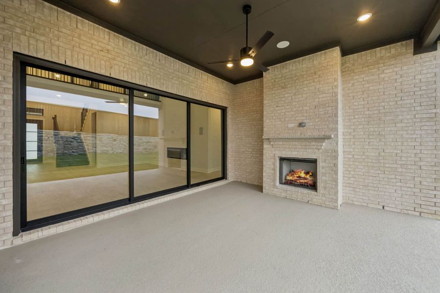 Exterior details and patio area of a home in The Grove Frisco, Frisco (Image 24).