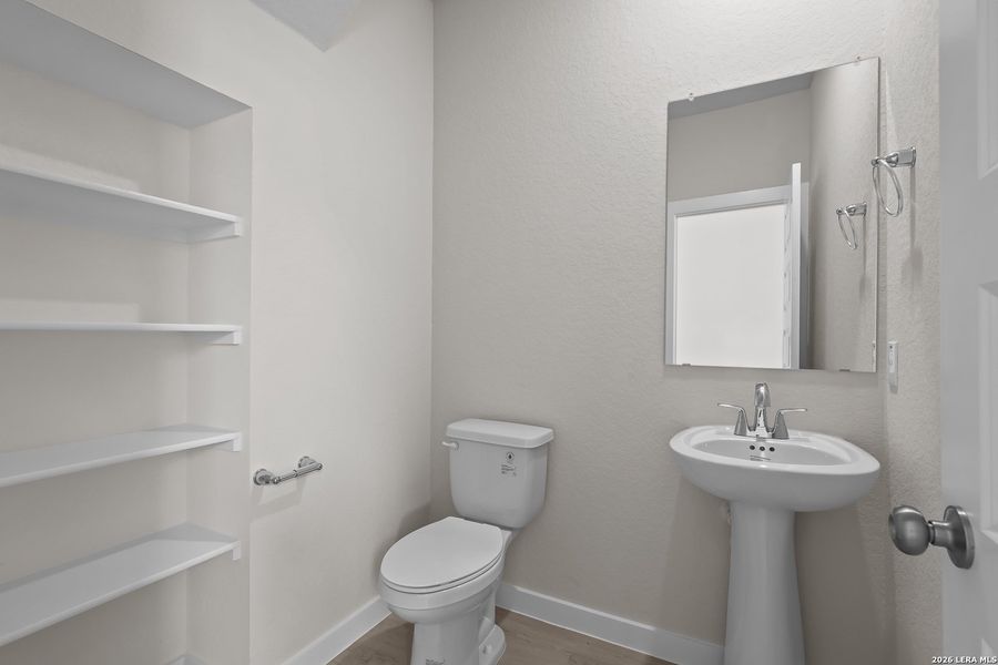 Furnished interior view inside a new home in Spring Creek, San Antonio (Image 12).