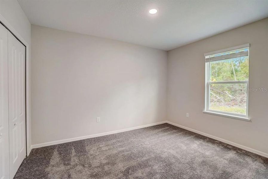 Spacious, unfurnished interior of a new home in Royal Highlands, Weeki Wachee (Image 14).