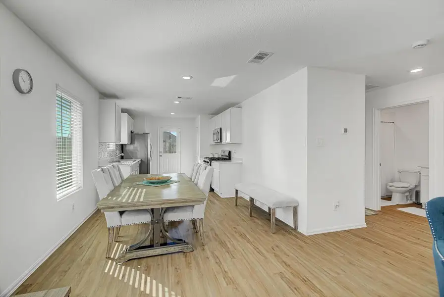 Furnished interior view inside a new home in Pinewood at Grand Texas: Colonial & Cottage Collections, New Caney (Image 4).