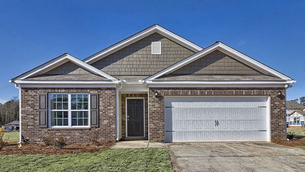 Front exterior of a new home in Wildbrook Village, Waynesville, NC, highlighting curb appeal (Image 1). Front exterior of a new home in Wildbrook Village, Waynesville, NC, highlighting curb appeal (Image 1).