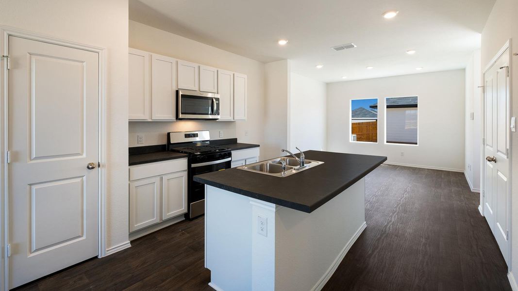 Furnished interior view inside a new home in Valverde, Bastrop (Image 4).