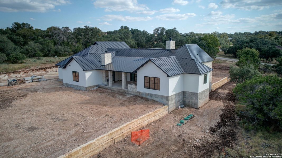 Front exterior of a new home in , New Braunfels, TX, highlighting curb appeal (Image 21). Front exterior of a new home in , New Braunfels, TX, highlighting curb appeal (Image 21).