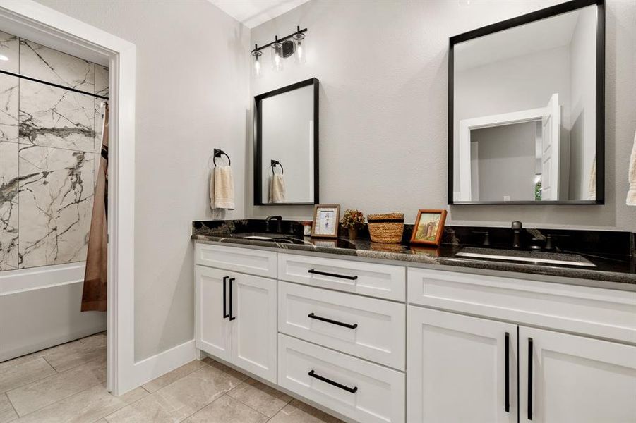 Full Bathroom includes Dual Sinks, Marble Counters Extra Long Counter Space and Door Separating the Shower and Toilet Area for privacy.