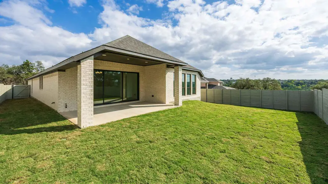 Exterior details and patio area of a home in Wolf Ranch 51', Georgetown (Image 2). Exterior details and patio area of a home in Wolf Ranch 51', Georgetown (Image 2).