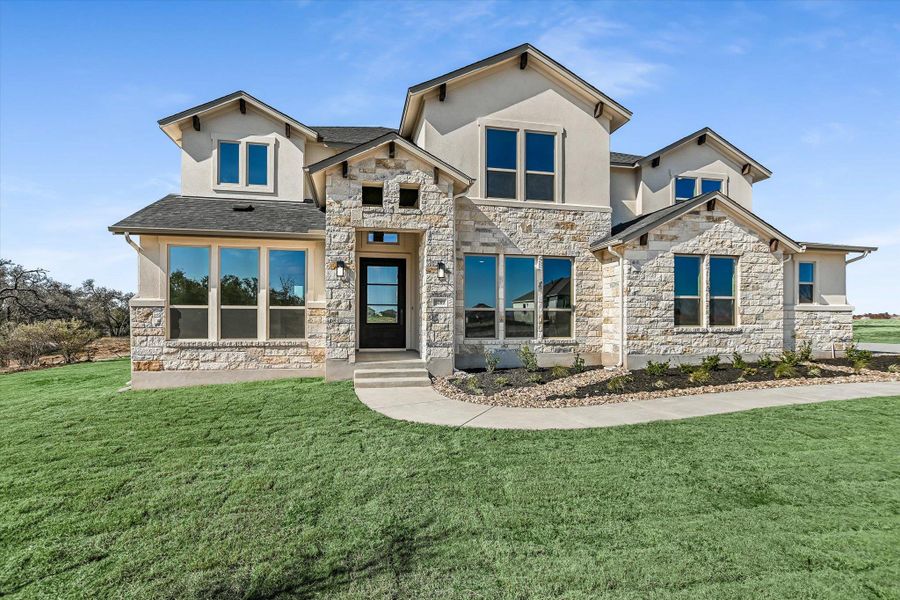 Front exterior of a new home in Leander Estates, Leander, TX, highlighting curb appeal (Image 24).