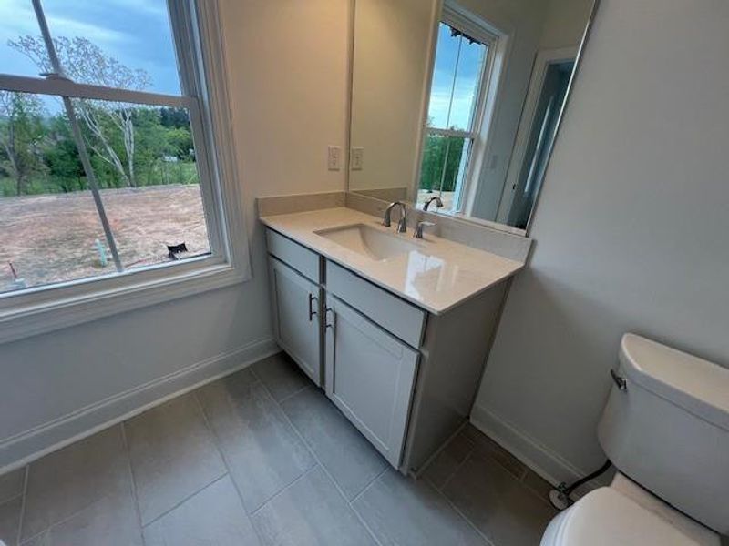 Furnished interior view inside a new home in Palisades Townhomes, Cumming (Image 4). Furnished interior view inside a new home in Palisades Townhomes, Cumming (Image 4).