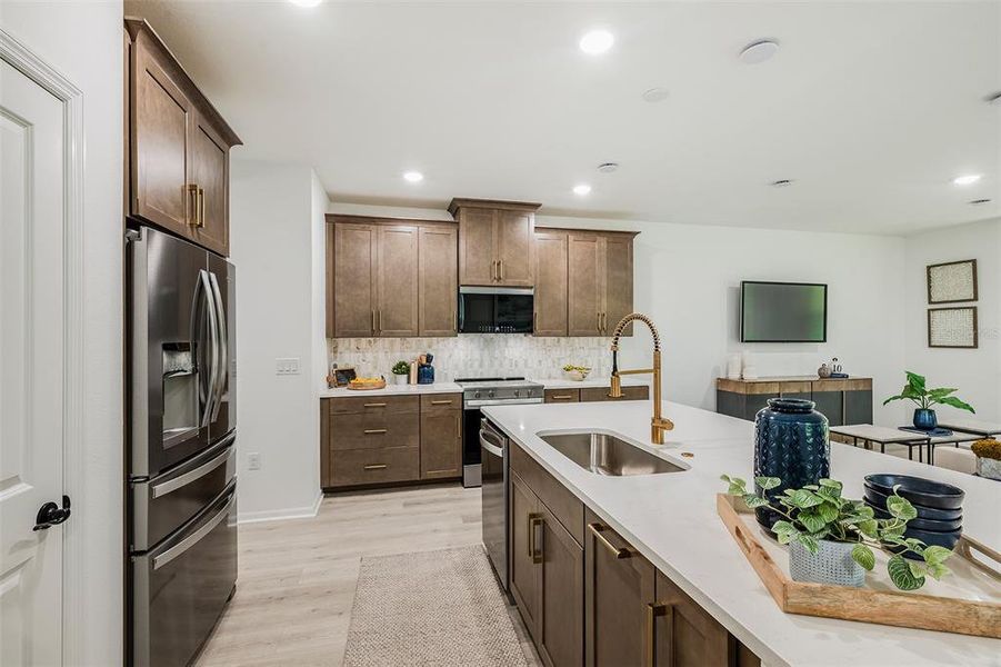 Furnished interior view inside a new home in Towns at Greenleaf, Oviedo (Image 7).