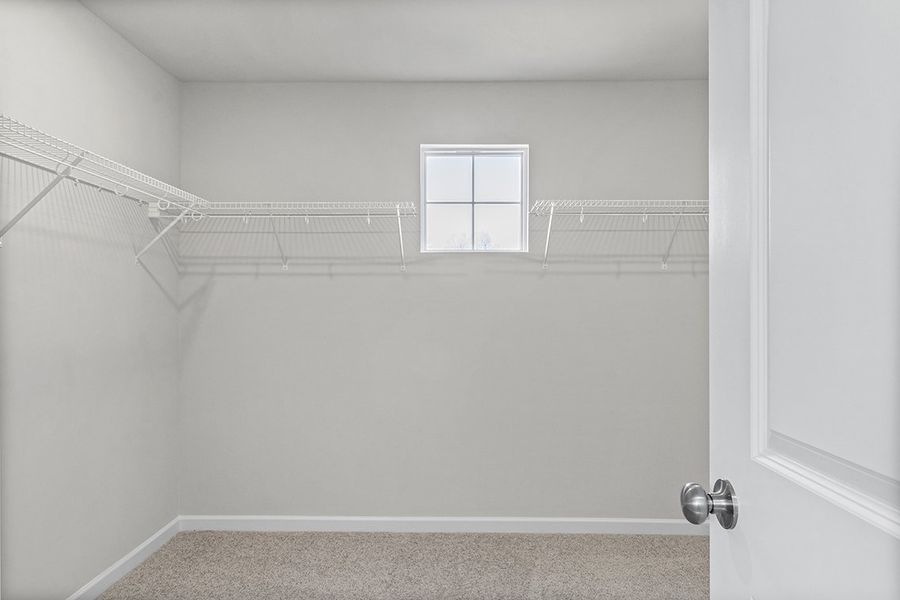 A white room with a white door. A white room with a white door.