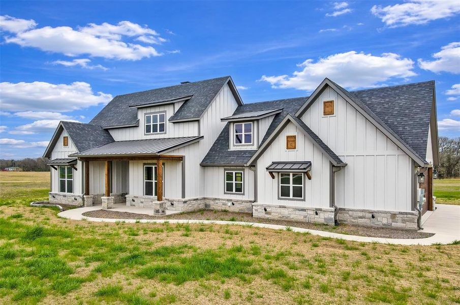 Front exterior of a new home in , Wills Point, TX, highlighting curb appeal (Image 21).