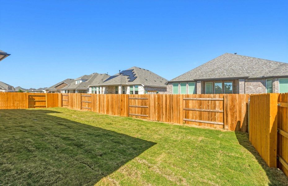 Exterior details and patio area of a home in 6 Creeks, Kyle (Image 25).