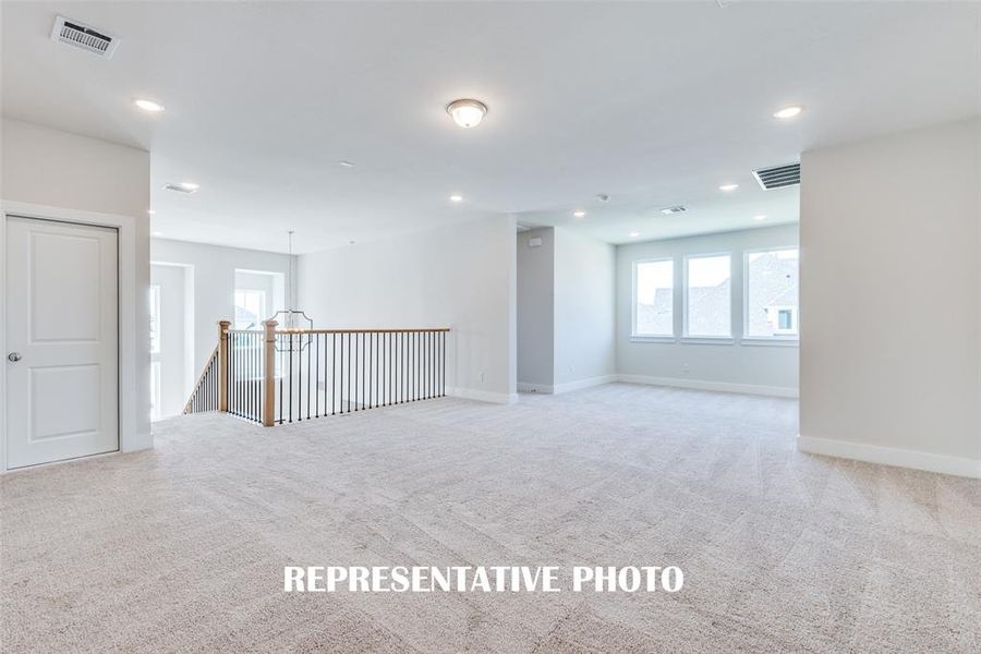 Your new light filled game room is spacious enough to host big game day parties or family game night!  REPRESENTATIVE PHOTO.