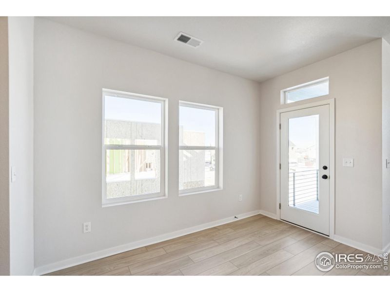 Spacious, unfurnished interior of a new home in Kinston Mainstreet Townhomes, Loveland (Image 15).
