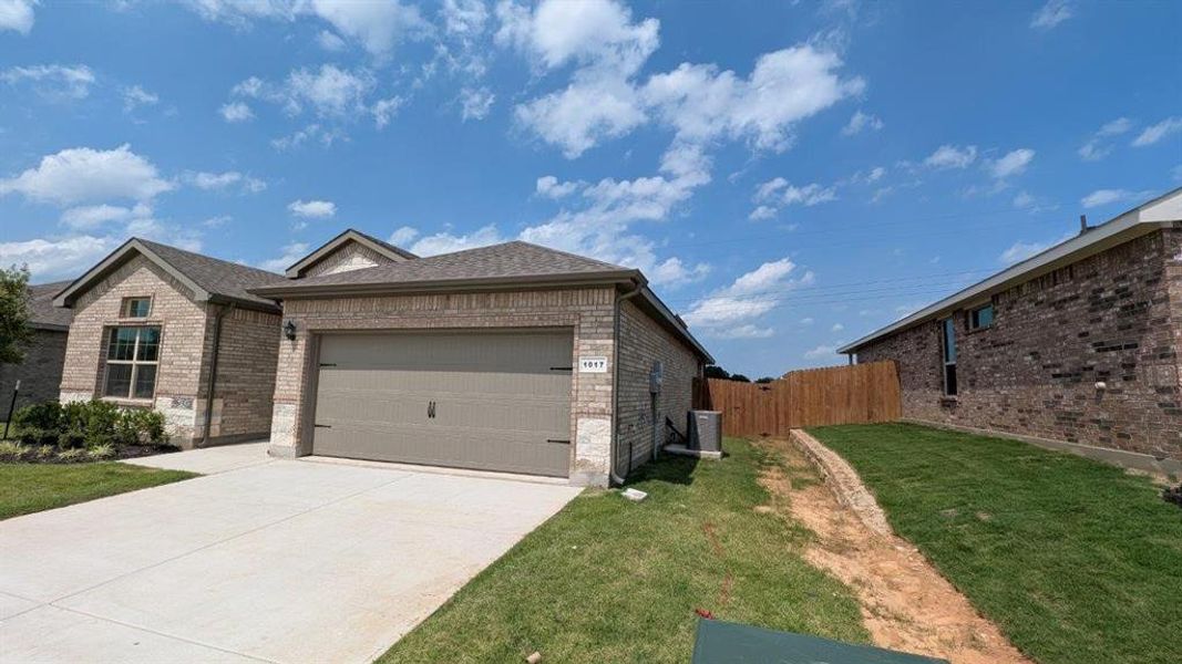 Front exterior of a new home in Lankford Farms, Cleburne, TX, highlighting curb appeal (Image 1).