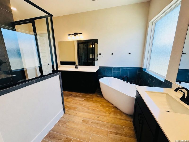 Furnished interior view inside a new home in Village at Three Oaks, Seguin (Image 5).