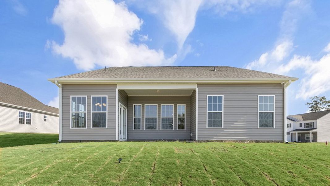 Exterior details and patio area of a home in The Villas at Martin Farms, Aberdeen (Image 15).