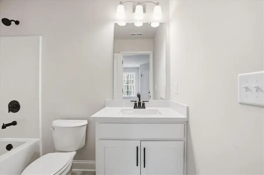 Furnished interior view inside a new home in Bradley Gin, Monroe (Image 13).