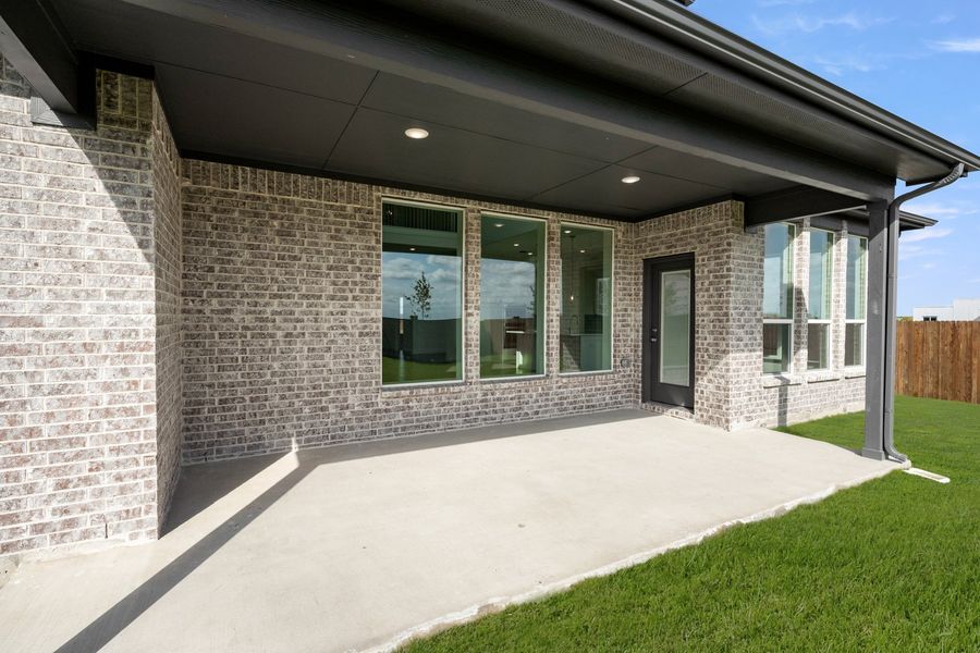 Exterior details and patio area of a home in Myrtle Creek, Waxahachie (Image 3). Exterior details and patio area of a home in Myrtle Creek, Waxahachie (Image 3).