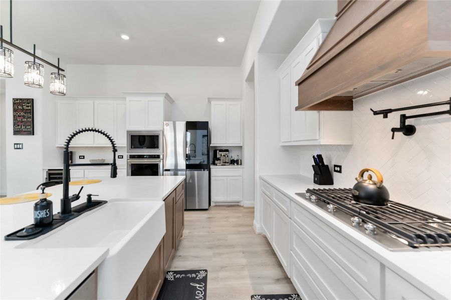 5 Burner gas range with pot filler. 5 Burner gas range with pot filler.