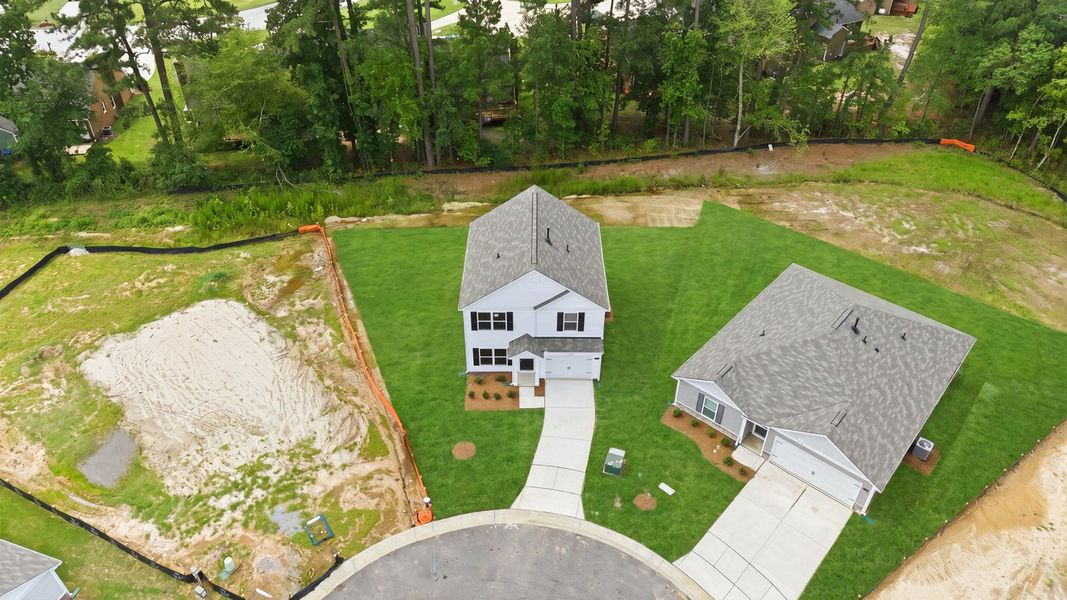 Front exterior of a new home in Jetstream Park, Wilson, NC, highlighting curb appeal (Image 22). Front exterior of a new home in Jetstream Park, Wilson, NC, highlighting curb appeal (Image 22).