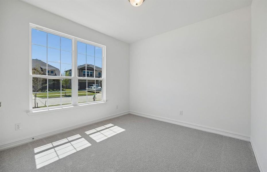 Secondary bedroom with large window