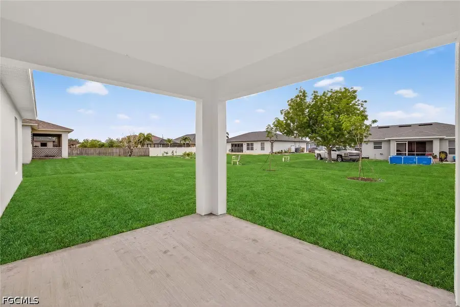 Exterior details and patio area of a home in Cape Coral, Cape Coral (Image 3).