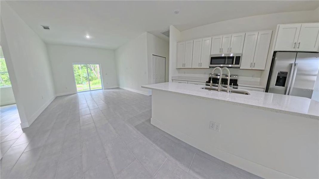 Furnished interior view inside a new home in , Dunnellon (Image 7).