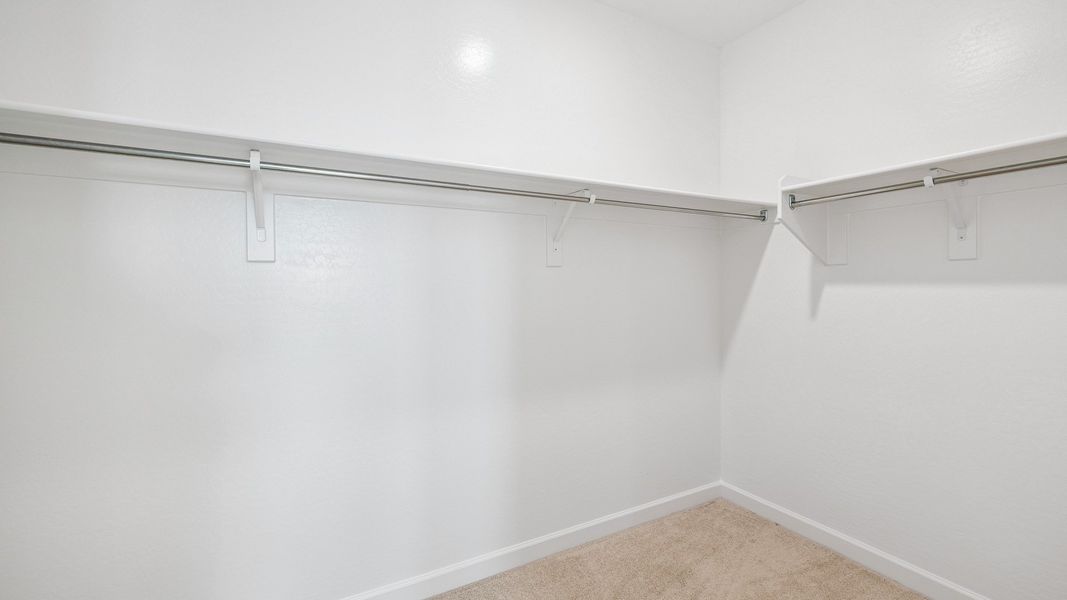 Spacious, unfurnished interior of a new home in Desert Moon Estates, Buckeye (Image 14).