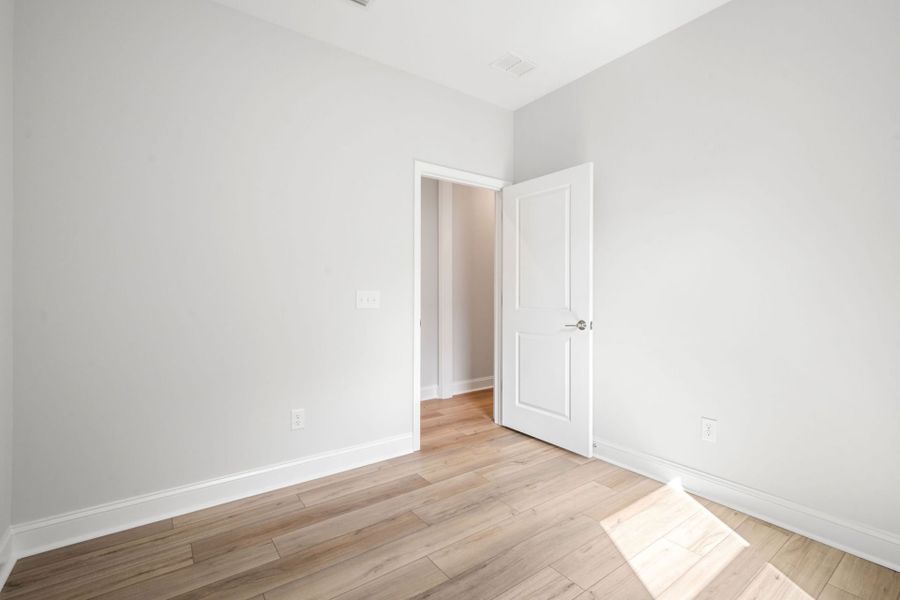 Spacious, unfurnished interior of a new home in Sun City Hilton Head, Bluffton (Image 13).