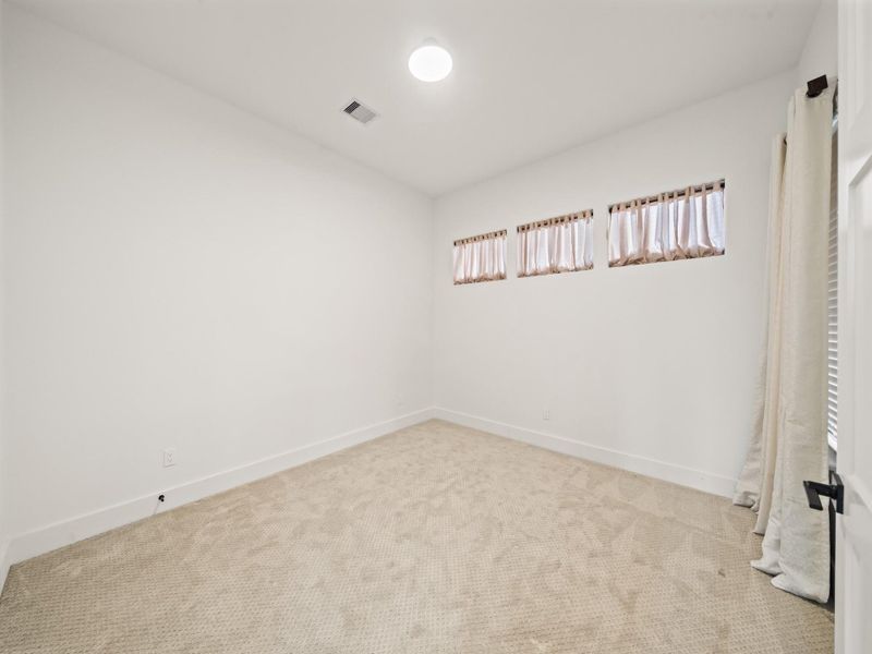 One of two secondary bed-rooms on second floor with Berber Carpet