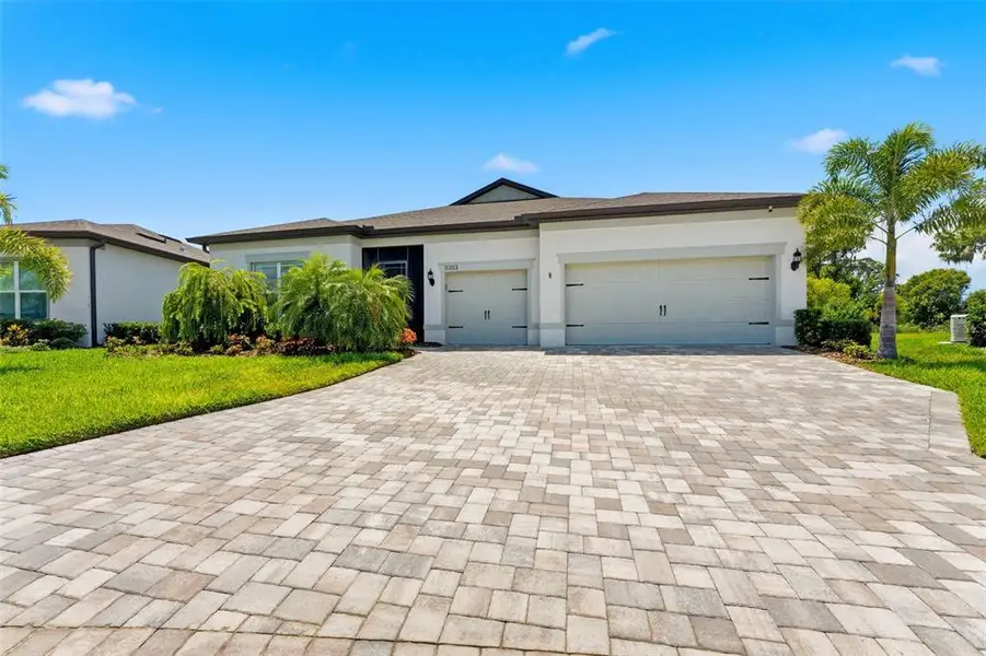 Front exterior of a new home in , Parrish, FL, highlighting curb appeal (Image 2). Front exterior of a new home in , Parrish, FL, highlighting curb appeal (Image 2).