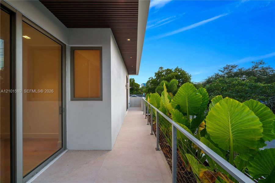Exterior details and patio area of a home in , Miami (Image 4).