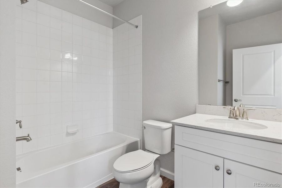 Furnished interior view inside a new home in Townhome Collection at Grand Vue at Interlocken, Broomfield (Image 11).