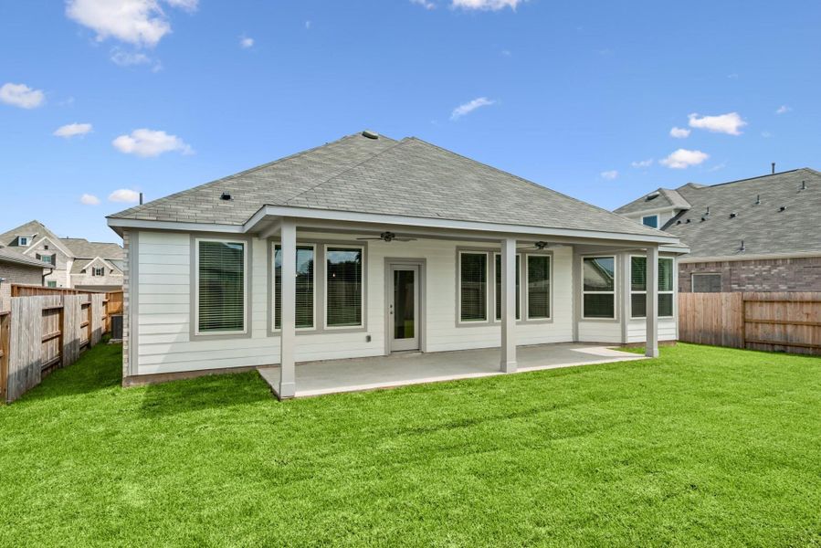 Exterior details and patio area of a home in Miller's Pond, Rosenberg (Image 2). Exterior details and patio area of a home in Miller's Pond, Rosenberg (Image 2).