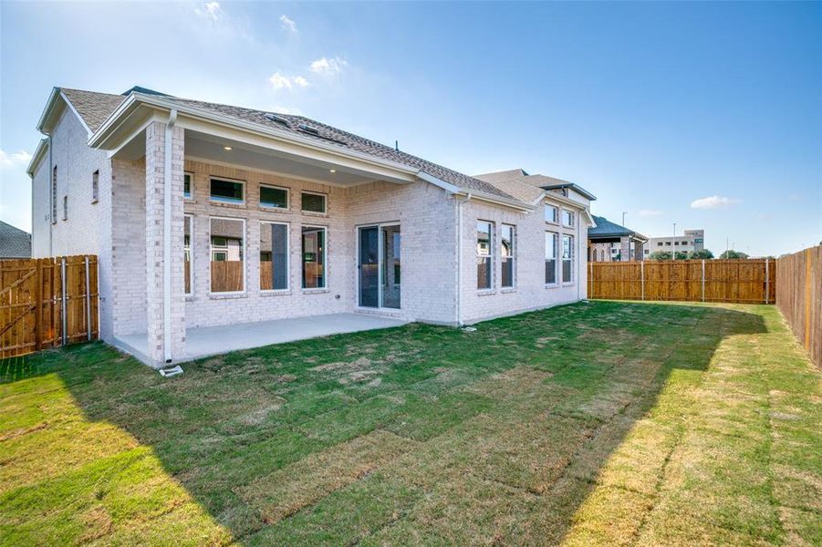 Exterior details and patio area of a home in West Crossing, Anna (Image 17). Exterior details and patio area of a home in West Crossing, Anna (Image 17).