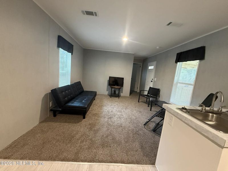 Furnished interior view inside a new home in , Florahome (Image 6).