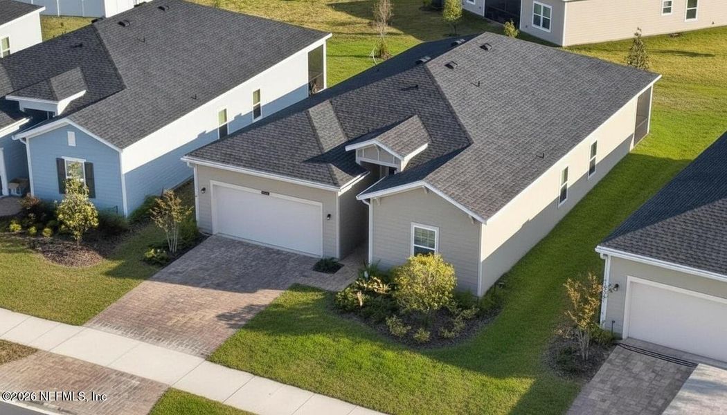 Front exterior of a new home in , Jacksonville, FL, highlighting curb appeal (Image 21).