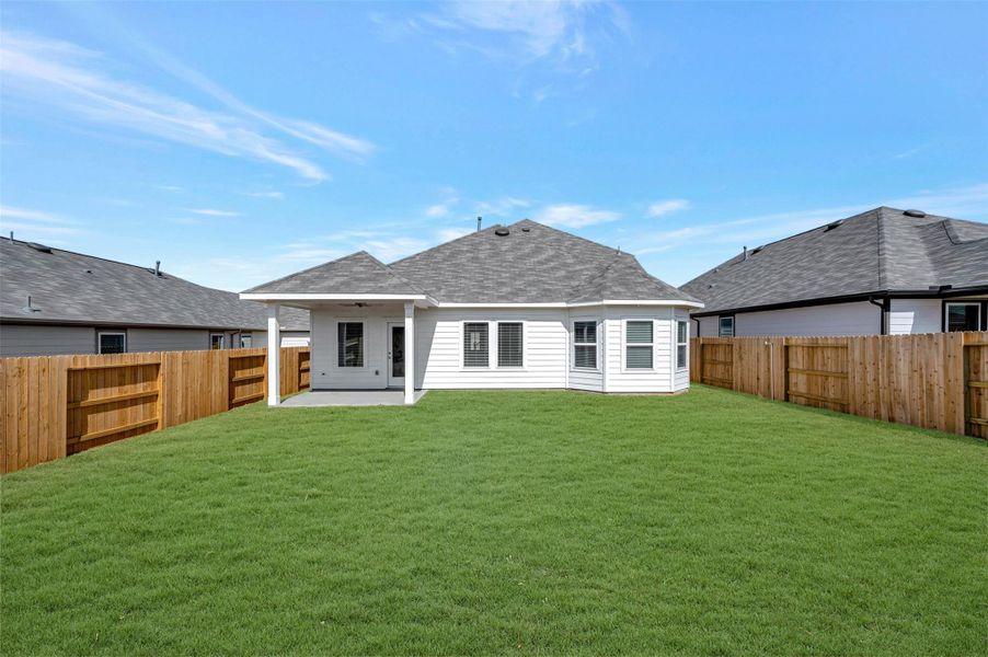 Exterior details and patio area of a home in Lone Star Landing, Montgomery (Image 25).