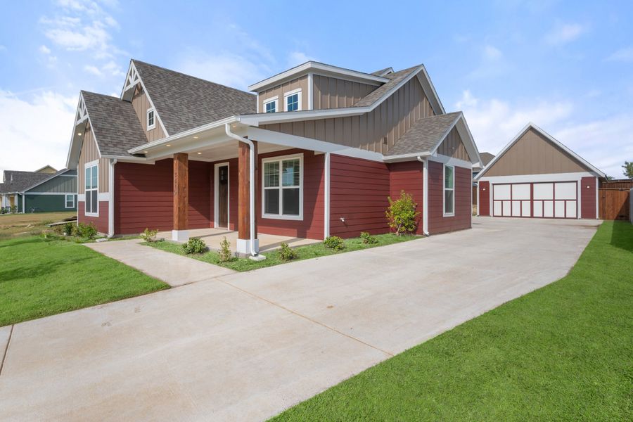 Front exterior of a new home in Heritage Towne, Midlothian, TX, highlighting curb appeal (Image 24). Front exterior of a new home in Heritage Towne, Midlothian, TX, highlighting curb appeal (Image 24).
