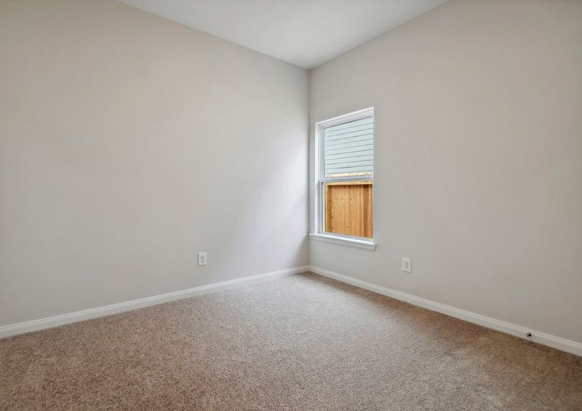 Secondary bedroom with lush carpet Secondary bedroom with lush carpet