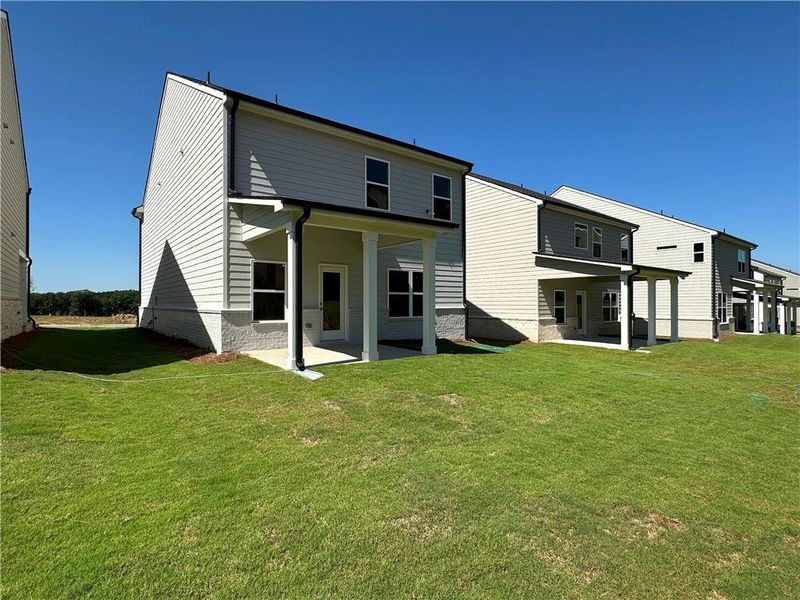 Exterior details and patio area of a home in Kentmere, Auburn (Image 26).