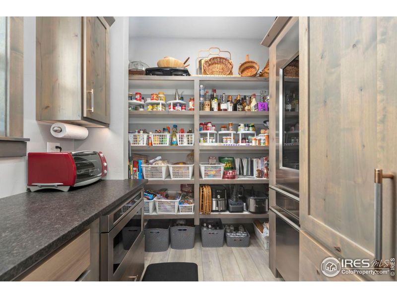 Kitchen pantry with second fridge and wine cooler