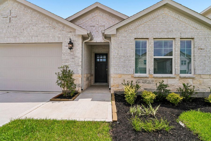 Exterior details and patio area of a home in Riviera Pines - Classic Series, Huffman (Image 24). Exterior details and patio area of a home in Riviera Pines - Classic Series, Huffman (Image 24).