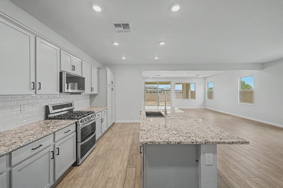 Furnished interior view inside a new home in Avanti at Granite Vista, Waddell (Image 9).