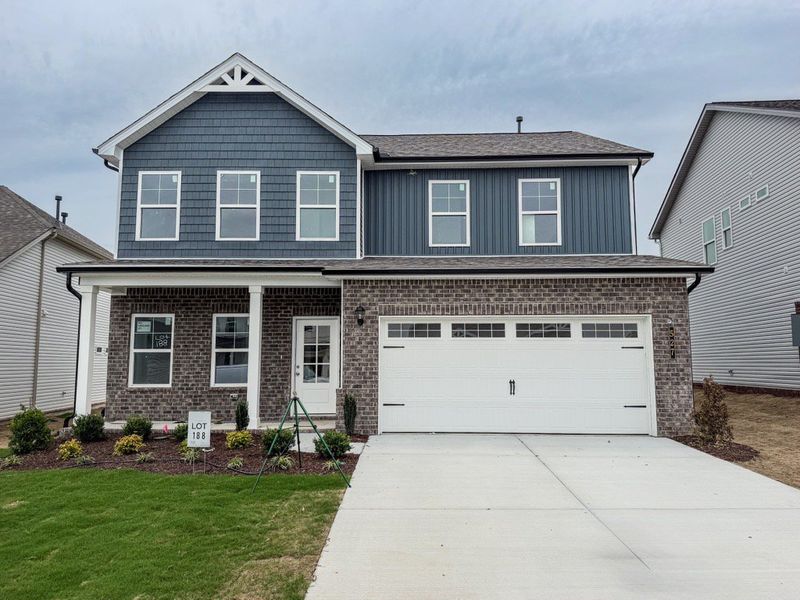 Front exterior of a new home in Langford Farms, Gallatin, TN, highlighting curb appeal (Image 2). Front exterior of a new home in Langford Farms, Gallatin, TN, highlighting curb appeal (Image 2).