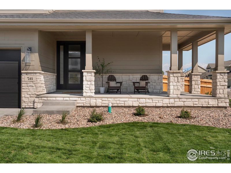 Front exterior of a new home in Greenspire At Windsor Lake, Windsor, CO, highlighting curb appeal (Image 2).
