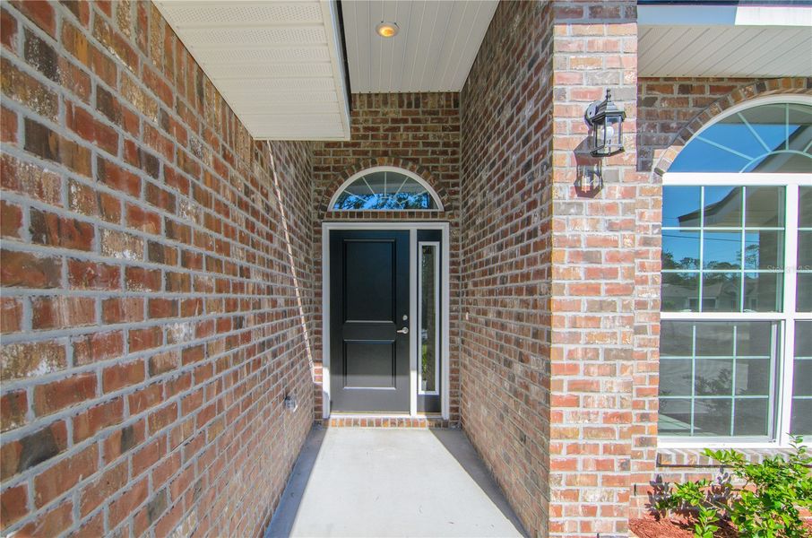 Exterior details and patio area of a home in Palm Coast, Palm Coast (Image 23).